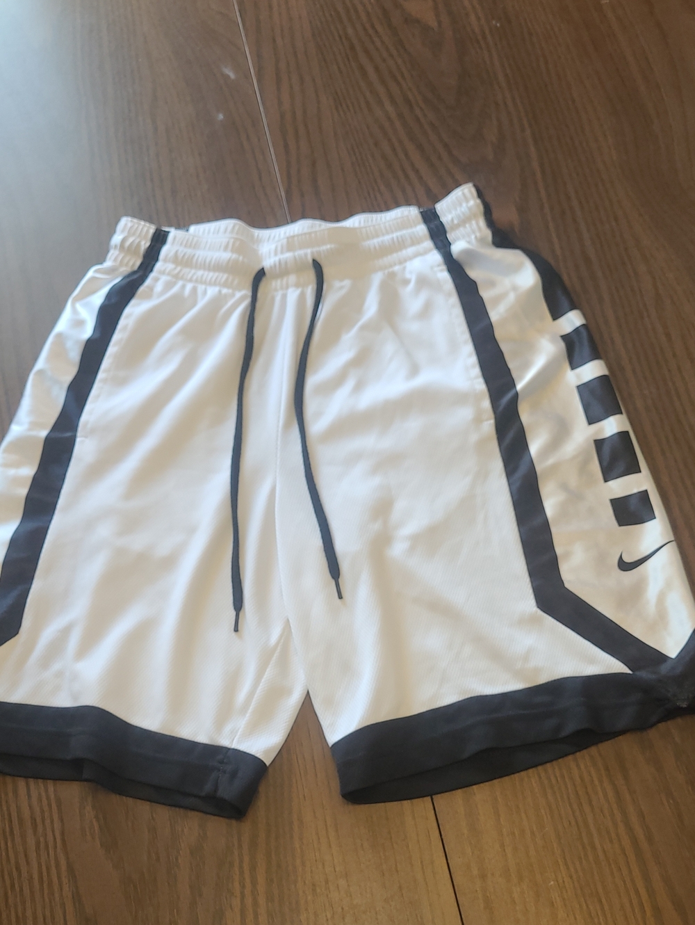Nike Men's Athletic Basketball White Shorts with Black Trim and  Stripe Size M